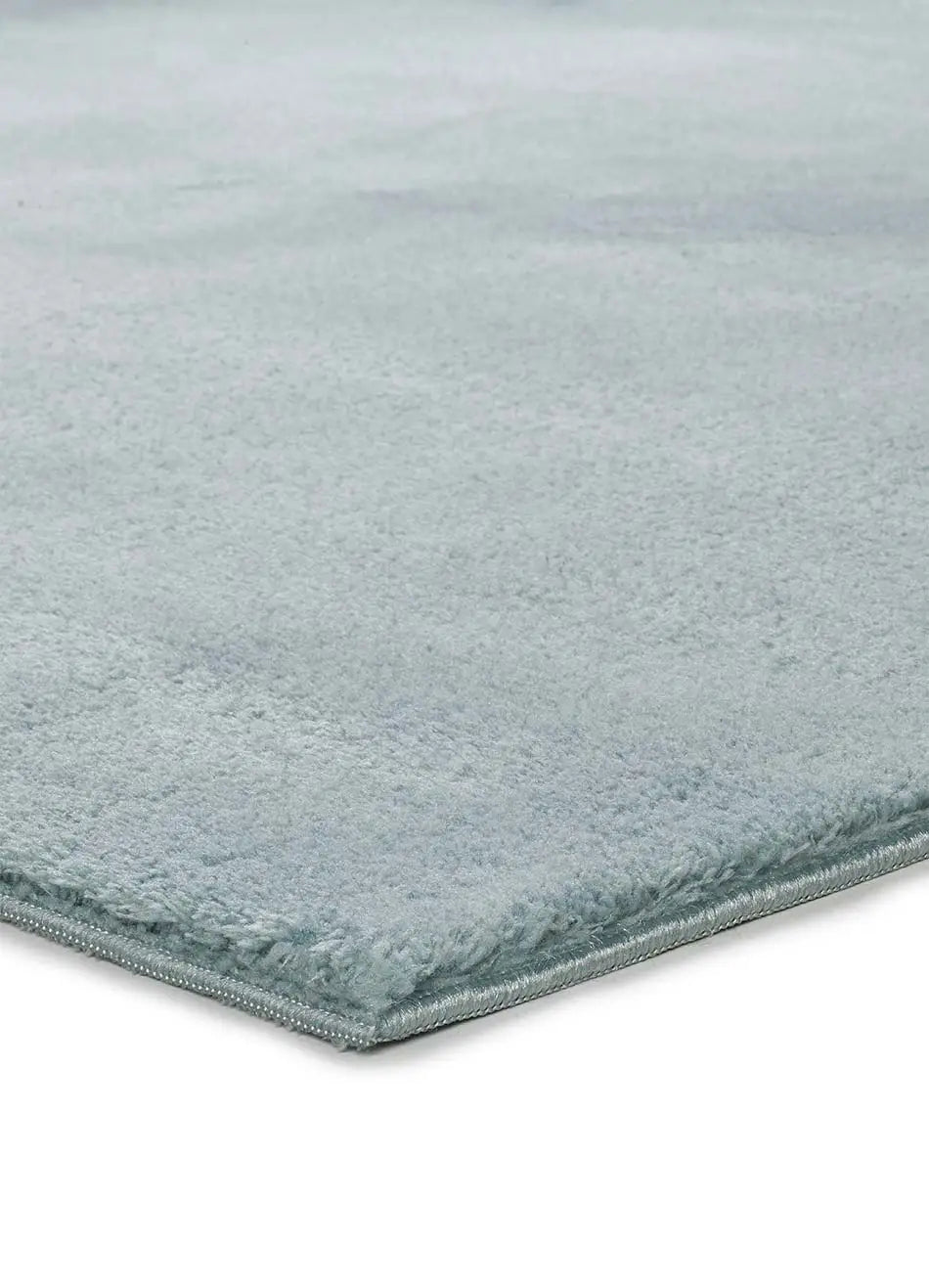 alfombra-a-medida-loft-liso-azul-Esquina-Universal